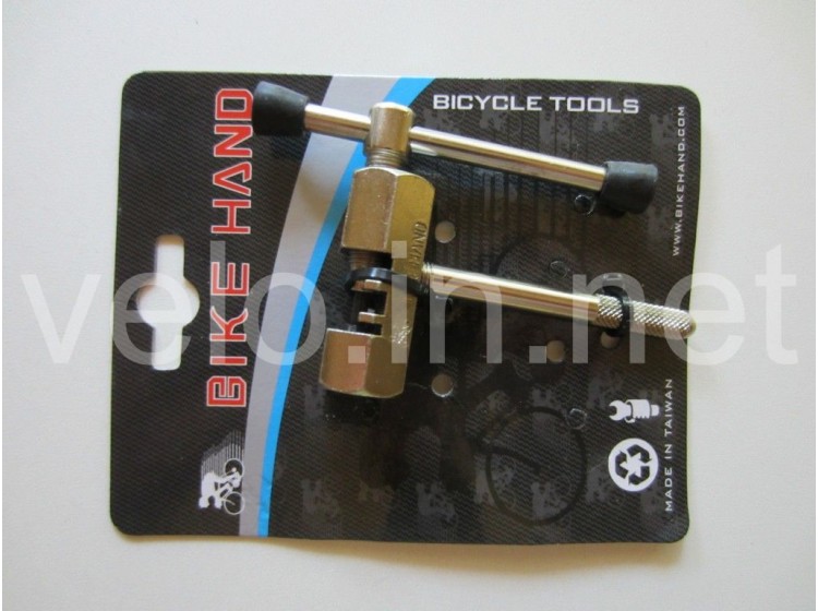 Вижимання ланцюга Bike Hand, з гвинтом, що фіксує ланцюг.
